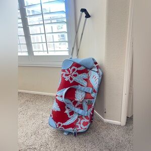 Vintage Roxy Rolling Luggage Bag. Look at pictures‎ well for all wears
